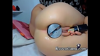 Excited Cam Girl Inserts Massive Anal Toy