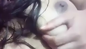 Big-Titted Girl Pleasuring Herself In A Homemade Video