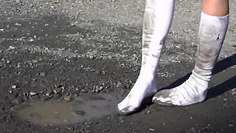 Wet And Wild: Black And White Contrast In Muddy Foot Fetish Video