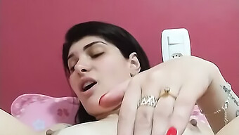 Brunette Woman Uses A Sex Toy To Pleasure Herself