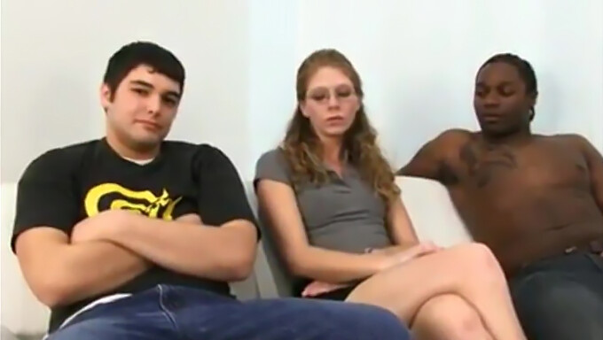 A Petite Woman Engages In Sexual Intercourse With A Large Black Penis While Her Boyfriend Looks On